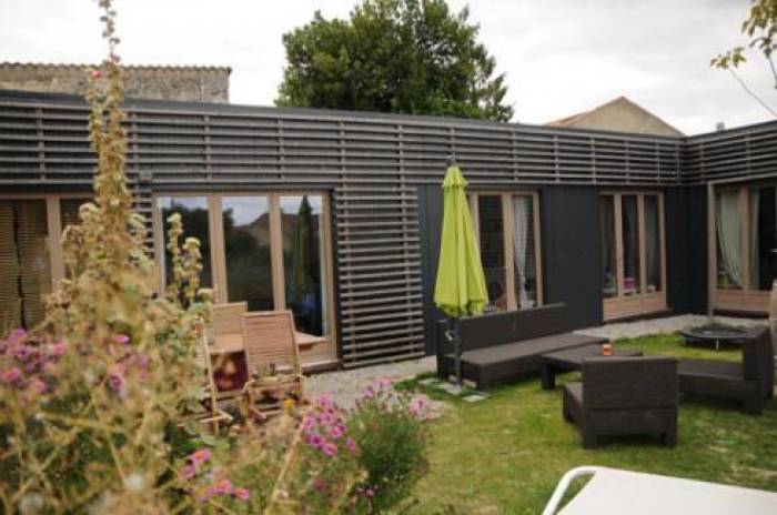 Trois containers, une maison